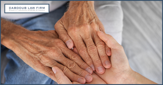 Person holding hands with someone who is sick