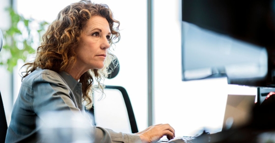 Middle-aged woman returning to work after her long term disability claim.