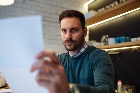 A man reading a document