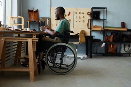 person with disability in a workshop