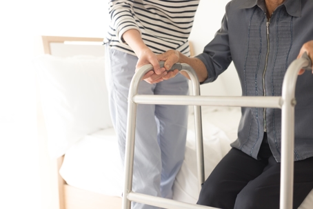 person helping disabled person